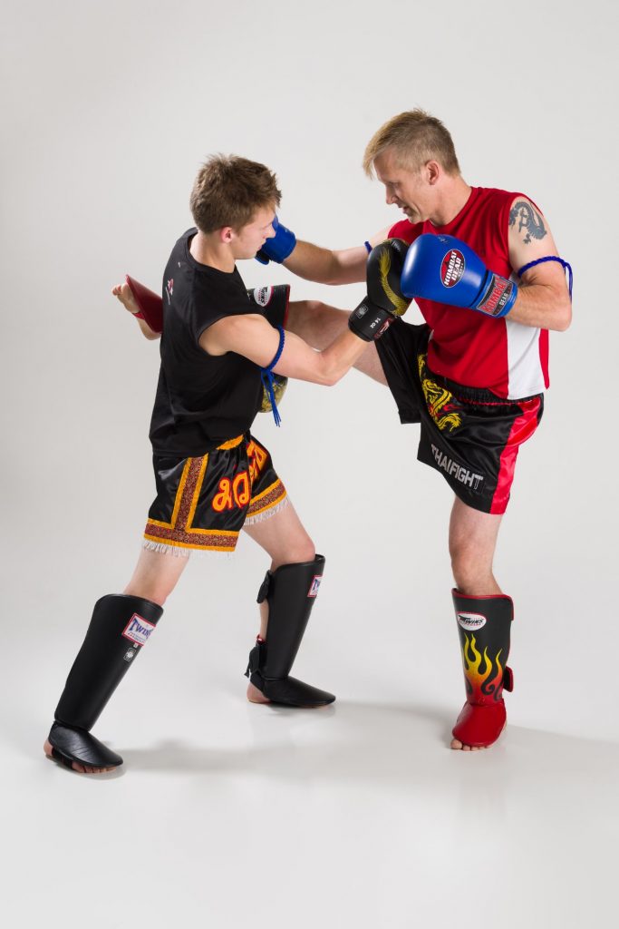 Two adult Arashi-Do Red Deer students sparring during a Muay Thai class