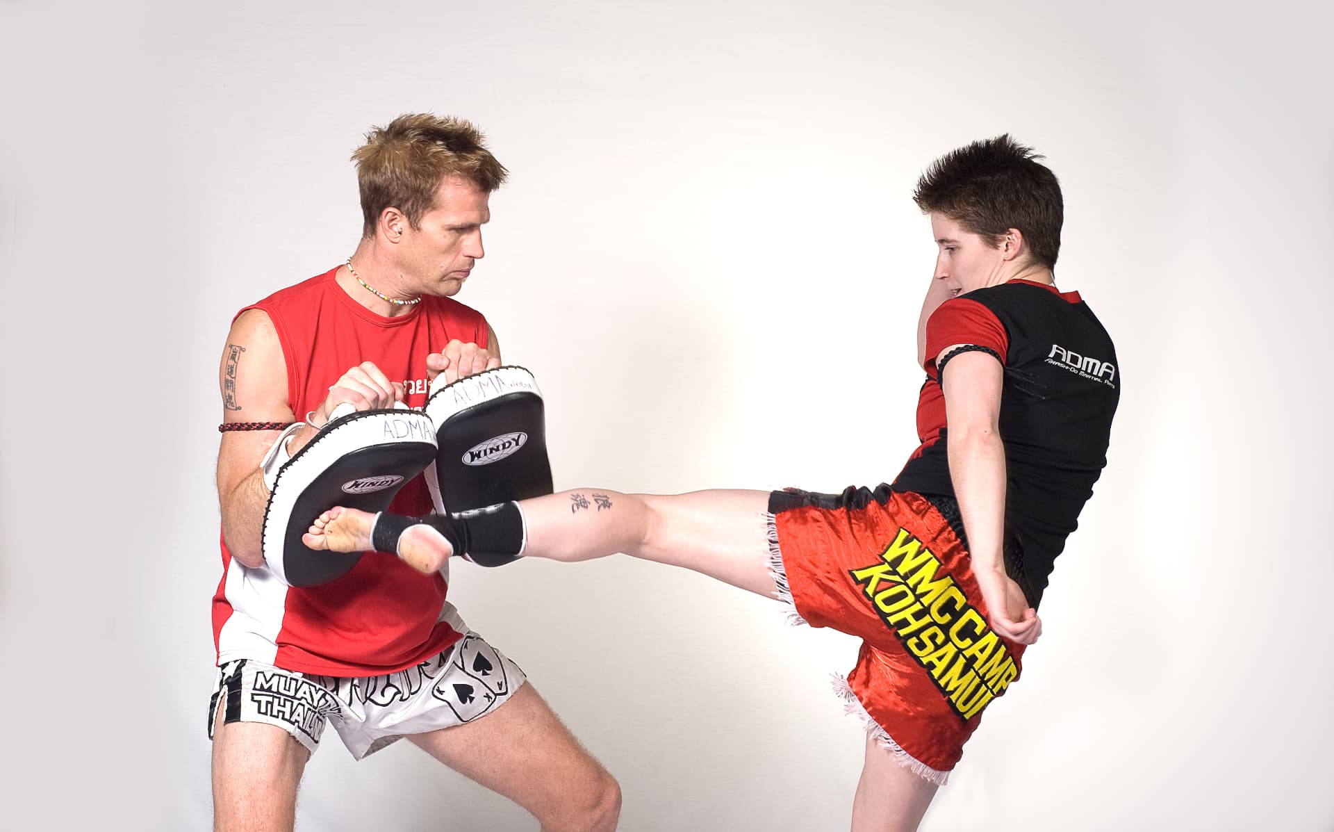 Adult Arashi-Do Red Deer student training striking during a mixed martial arts class